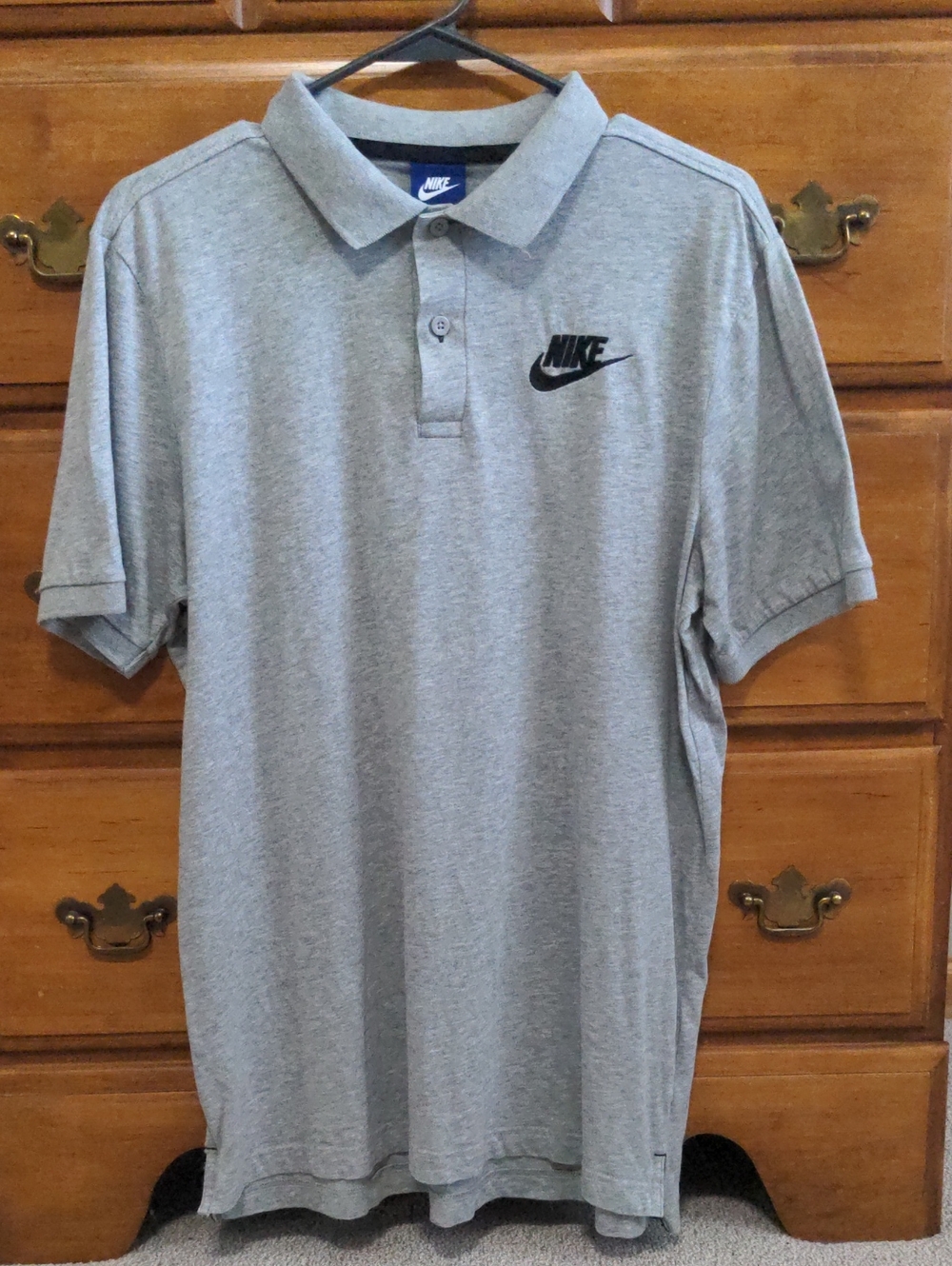 Nike Men’s Light Gray Polo with Black Swoosh